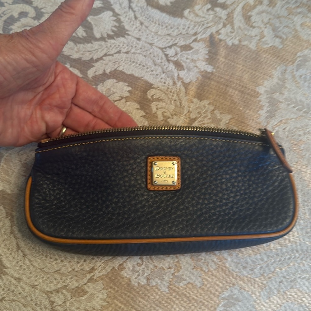 Dooney & Bourke zippered pouch navy/ brown trim/ red lining